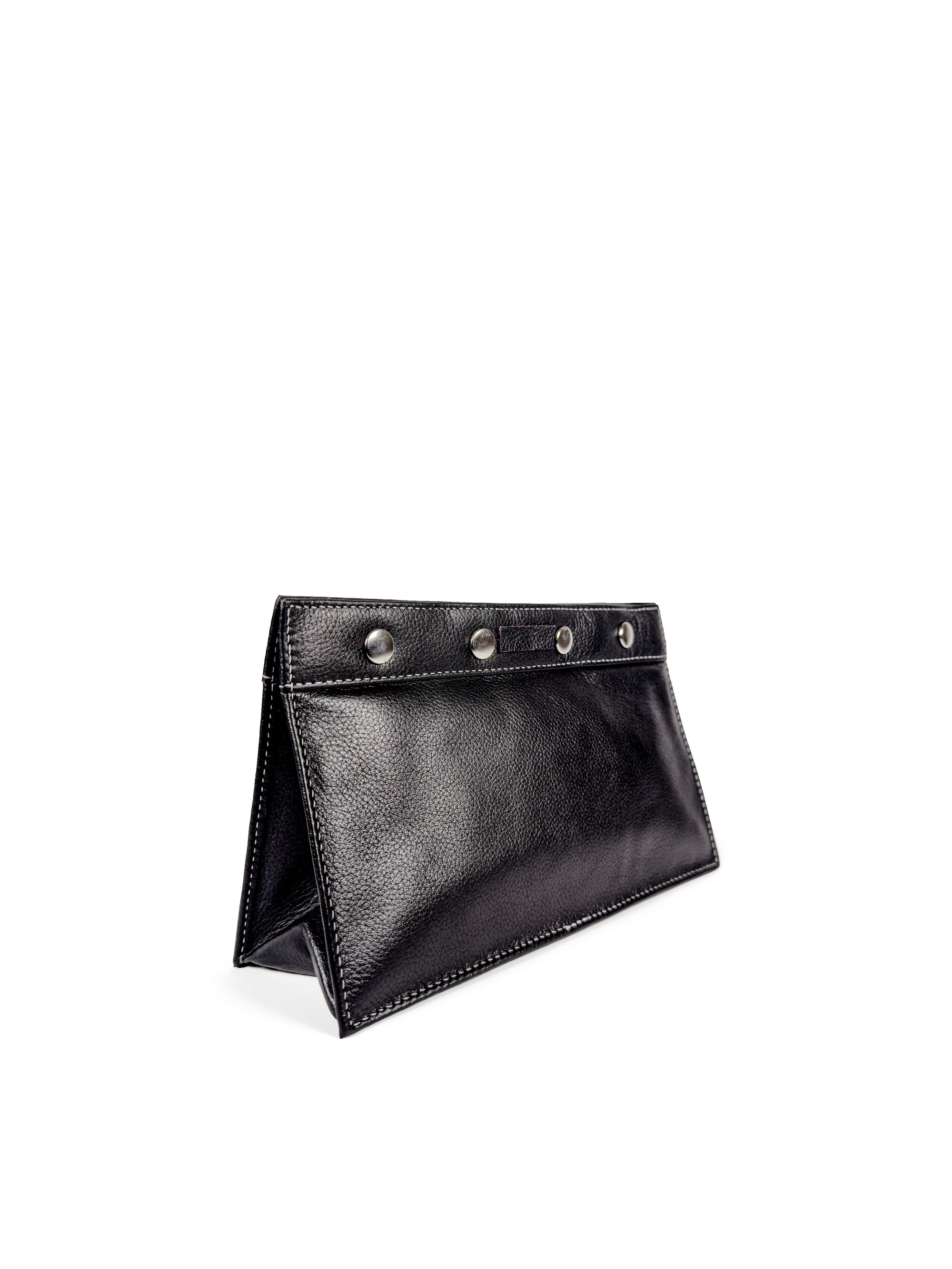 Subtle pebbled black leather toiletry bag with white accent stitches, 4 large silver snaps closure. Black nylon lining. 2 interior slip pockets and main compartment. Upcycled, circular, sustainable. 3/4 view.