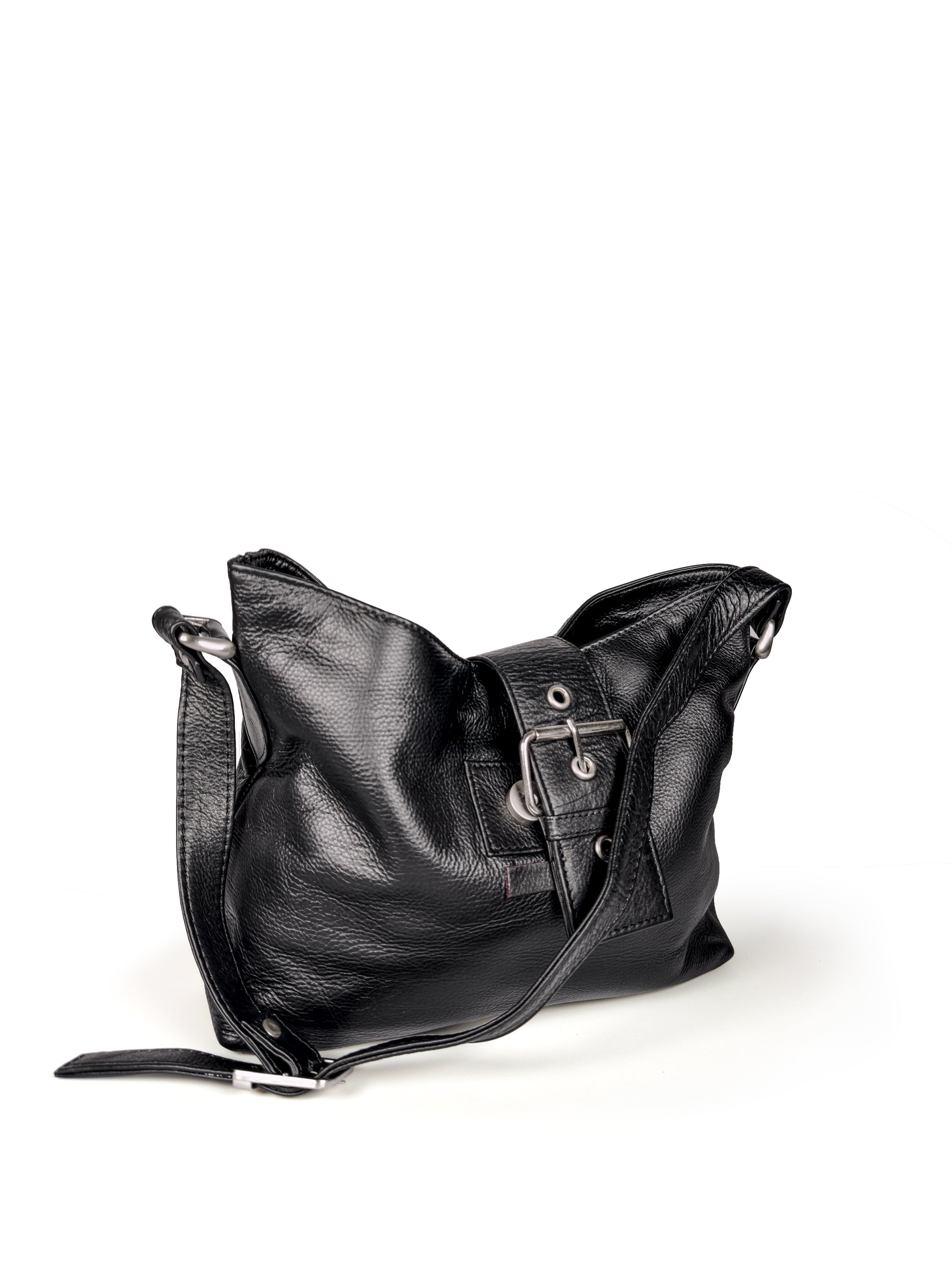 Relaxed view of Black leather handbag with a buckle detail on a white background