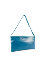 Small slim blue leather handbag. Elegant pale yellow satin lining and contrast stitch accent. Sunken zipper closure. 3/4 view. Upcycled, circular, sustainable.