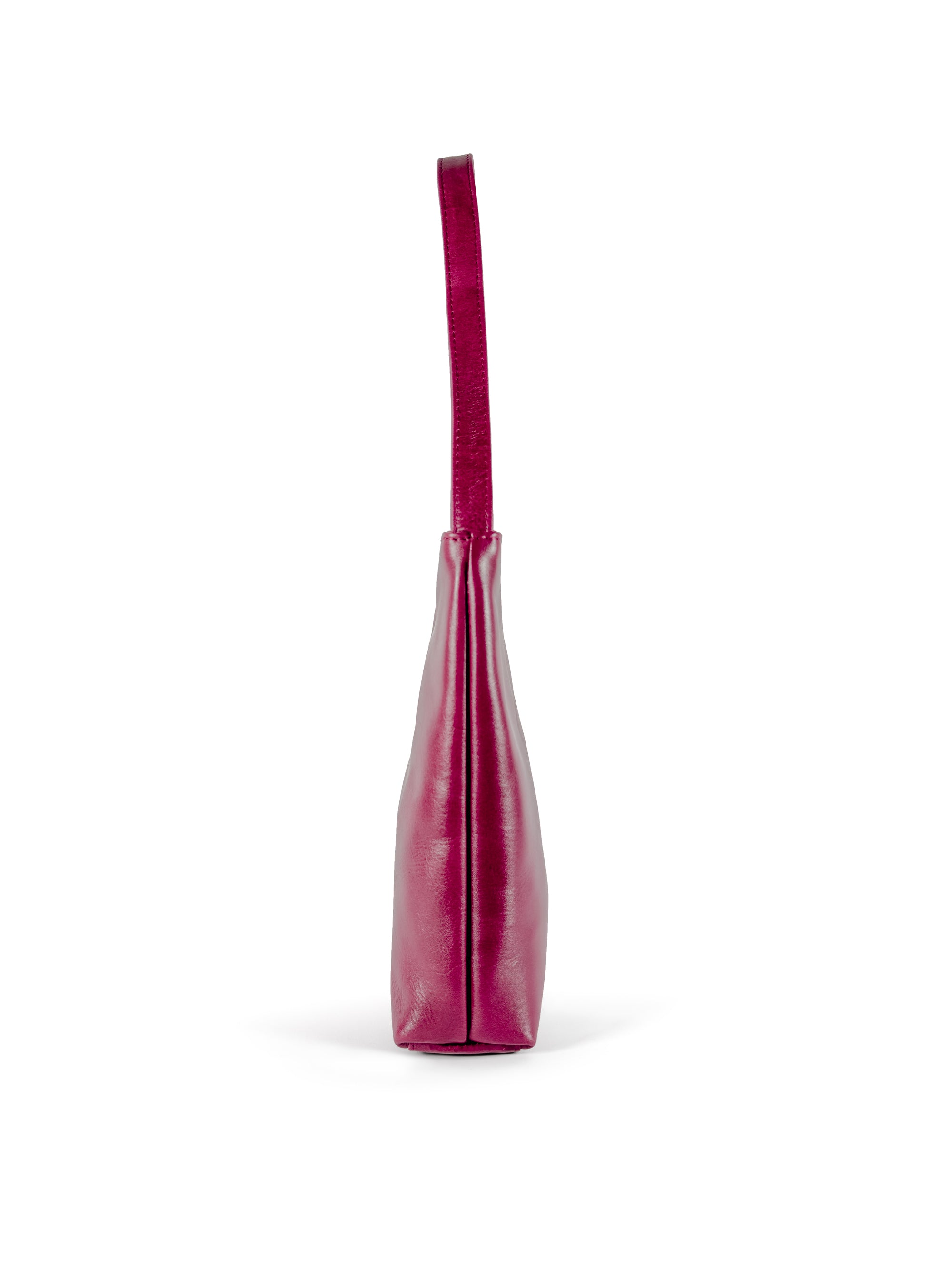 Medium polished burgundy leather handbag. Elegant muted pink satin lining. Sunken zipper closure. Side view 1. Upcycled, circular, sustainable.