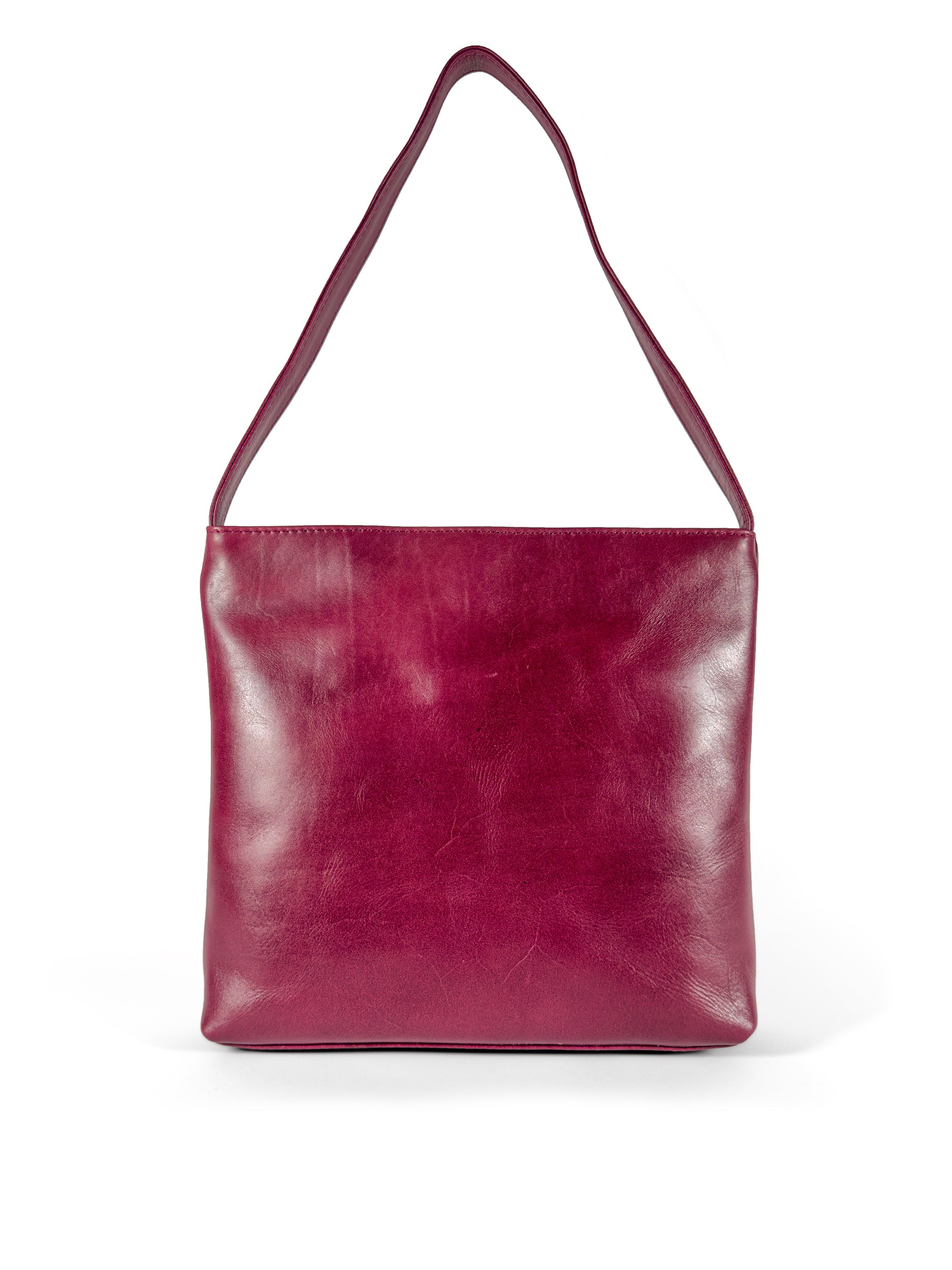 Medium polished burgundy leather handbag. Elegant muted pink satin lining. Sunken zipper closure. Back view. Upcycled, circular, sustainable.