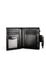 Small Wallet. Buttery pebbled black leather with nickel hardware. 1 magnet closure hidden under wide strap with buckle. Upcycled, circular, sustainable. Interior view.