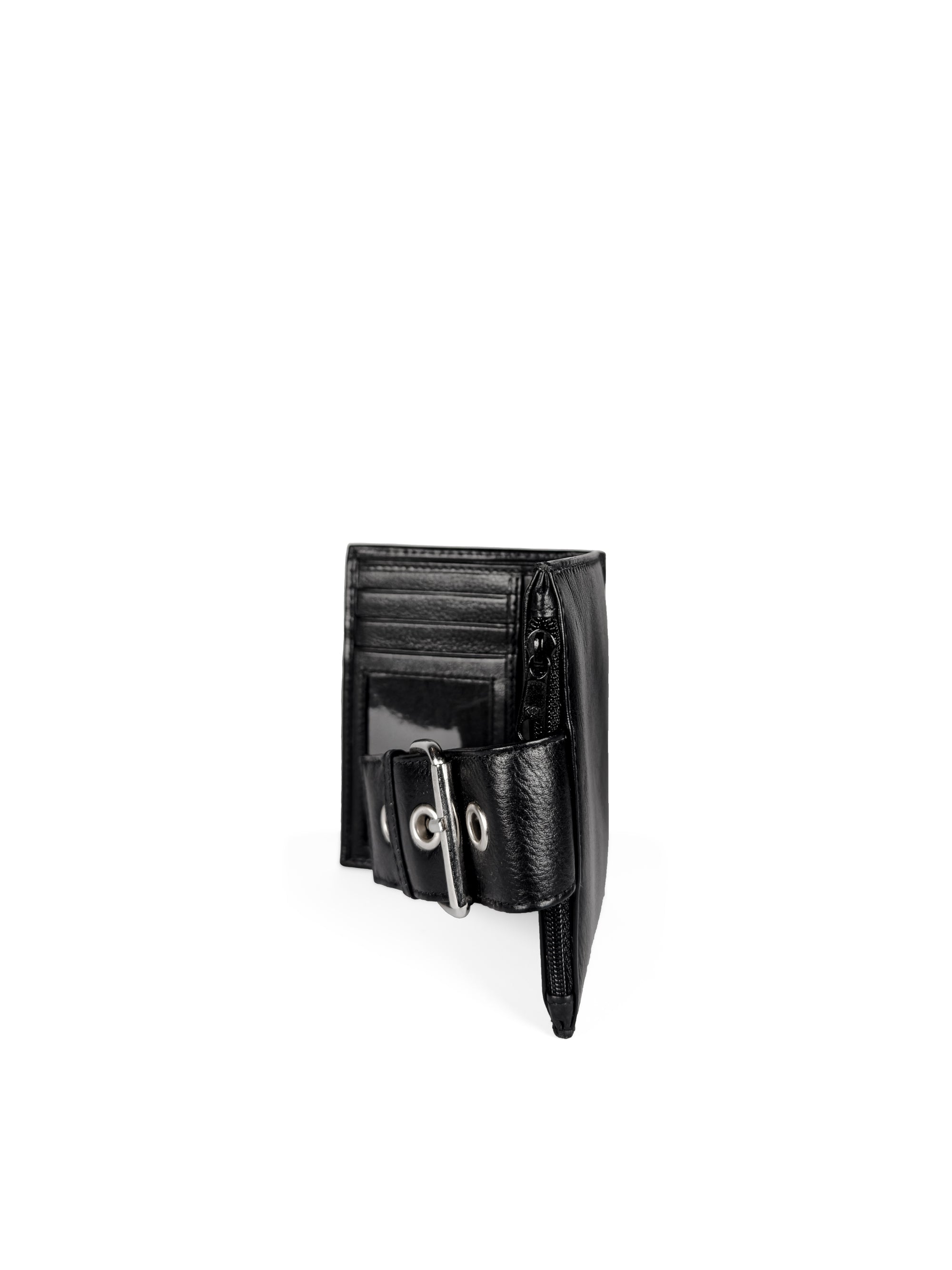 Small Wallet. Buttery pebbled black leather with nickel hardware. 1 magnet closure hidden under wide strap with buckle. Closure detail view. Upcycled, circular, sustainable.