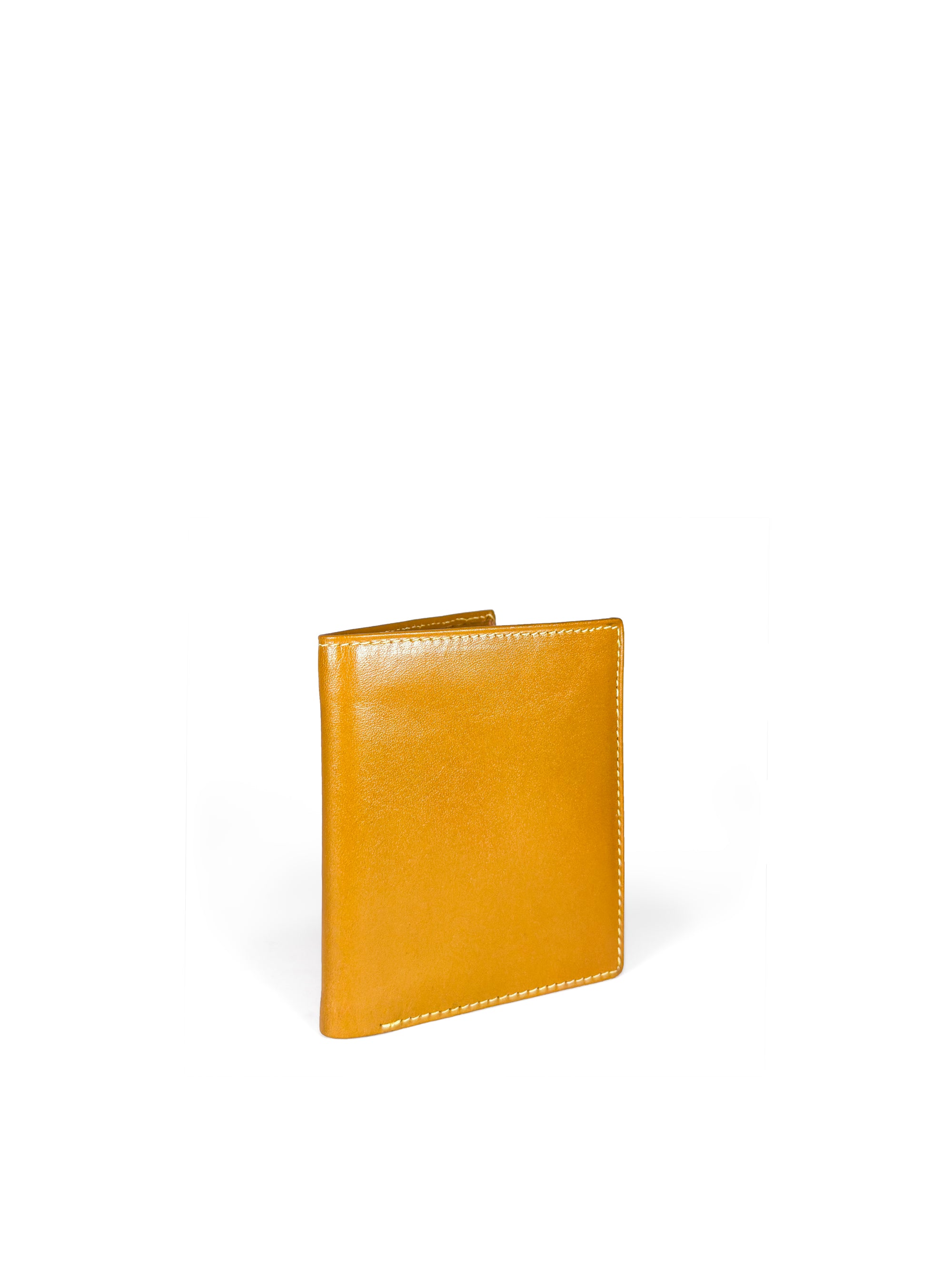 Polished tan leather mini wallet. Elegant muted lemon satin lining. Upcycled, circular, sustainable. 3/4 view 1.