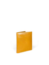 Polished tan leather mini wallet. Elegant muted lemon satin lining. Upcycled, circular, sustainable. 3/4 view 1.