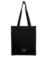 Small slim organic heavyweight canvas tote in black. Neon JX logo accent. Front view. Sustainable.