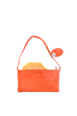 Small slim vivid orange leather handbag. Playful pale orange satin lining and contrast stitch accent. Sunken zipper closure. Lining view. Upcycled, circular, sustainable.